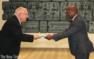 President of Israel Reuven Rivlin receives credentials from Ambassador Joseph Rutabana. (Courtesy)