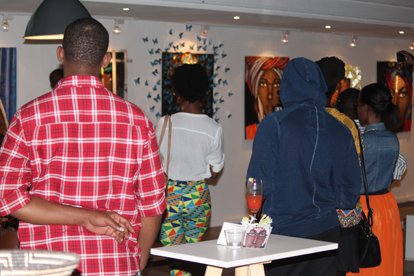 Art enthusiasts and curators gathered at Innovation Village to enjoy an evening of art. (All photos by Moses Opobo.)