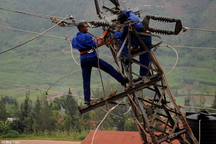 Rwanda Energy group workers fix electric cables. (File)