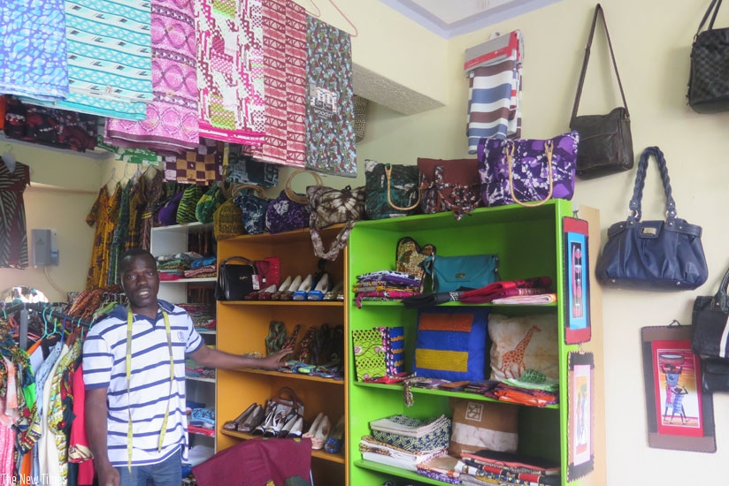 A tailor at a shop in Kanombe. To start a business like this one needs to do research besides raising some startup capital. (Shamim Nirere)