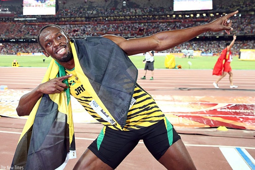 LIGHTENING BOLT: Jamaican sprint king Usain Bolt celebrates in the Bird's Nest Arena having won the 100m final at the World Championships on Sunday.,