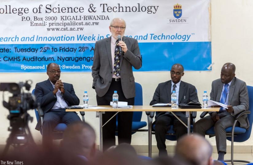 Prof James McWha, the vice-chancellor of the University of Rwanda (C), speaks at the forum on research and innovation in Kigali yesterday. (Timothy Kisambira)