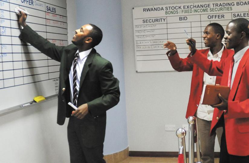 Traders during a session at the stock market. (File)