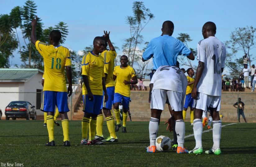 AS Muhanga players (in yellow), during a past league game against APR. They are yet to win a game this season after four rounds of matches. (Sam Ngendahimana)