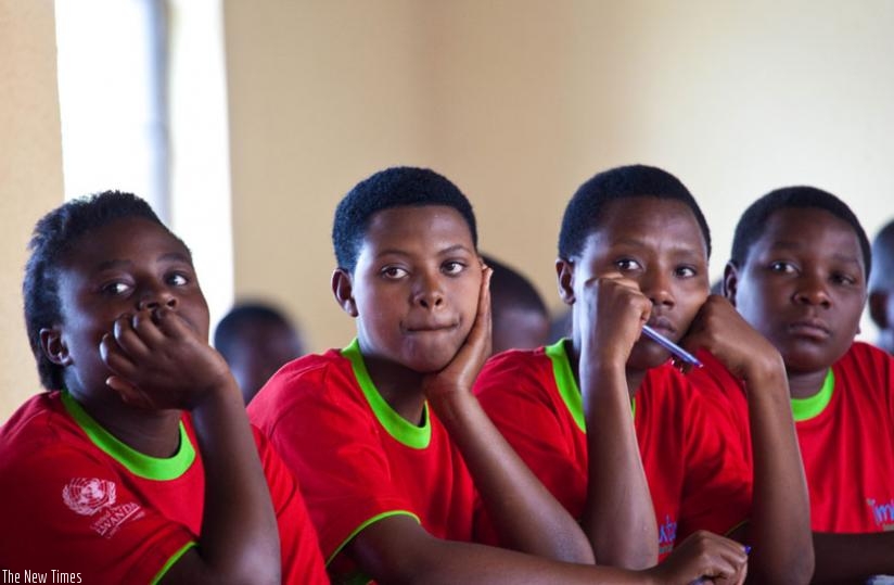 Girls under Imbuto Foundation follow presentations during a past holiday camp in Kicukiro district. (File)