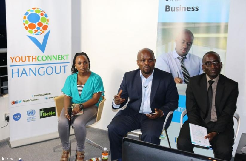 Minister Nsengimana (C) adresses the youth entrepreneures during the YouthConnekt Hangout. (Courtesy)