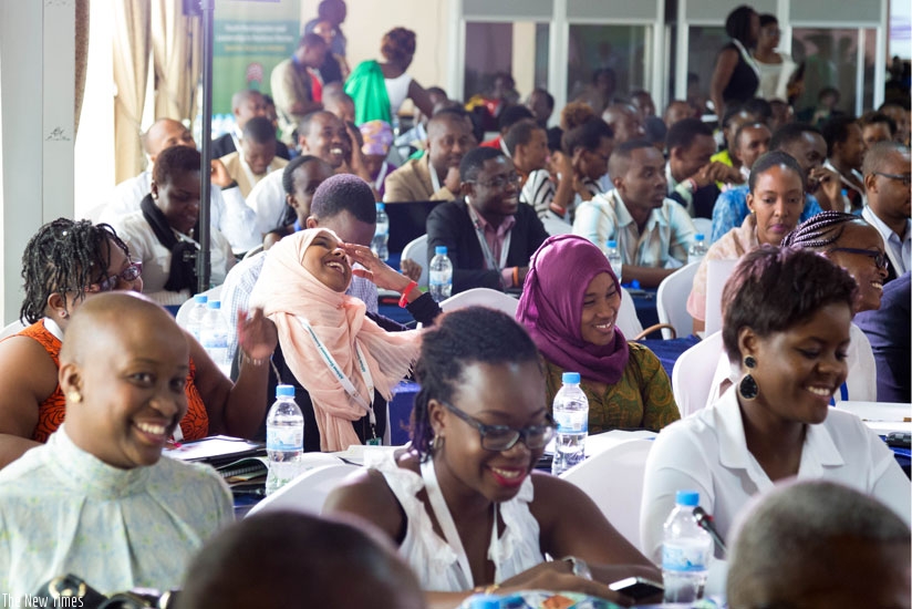 Participants share a light moment during the meeting in Kigali. (Timothy Kisambira)