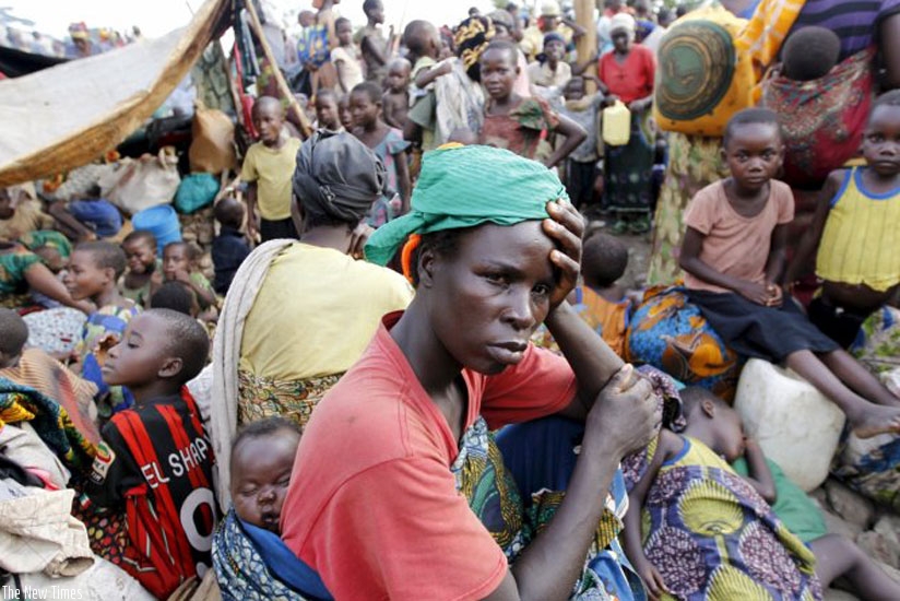 Burundian refugees with their belongings on the shores of Lake Tanganyika in Kagunga village, in western Tanzania as they wait to be transported to a refugee camp. (Net photo)