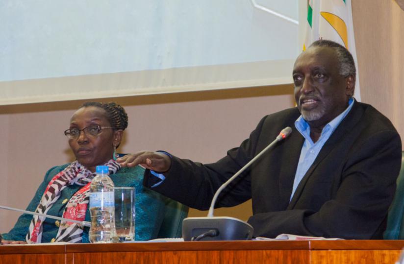 Senate Tito Rutaremara (R) speaks during the meeting as MP Juliana Kantengwa looks on. (Faustin Niyigena)