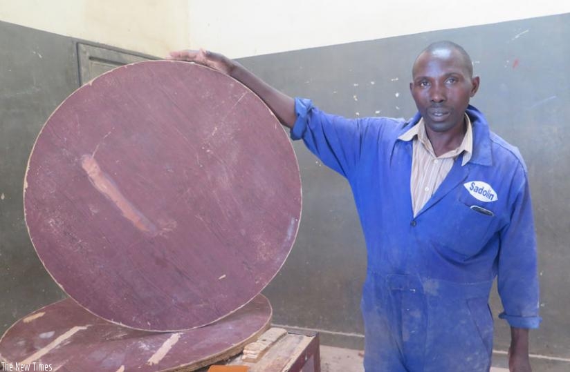 Habiyaremye displays some of the furniture made with banana fibres at his workshop in Kayonza town. (File)