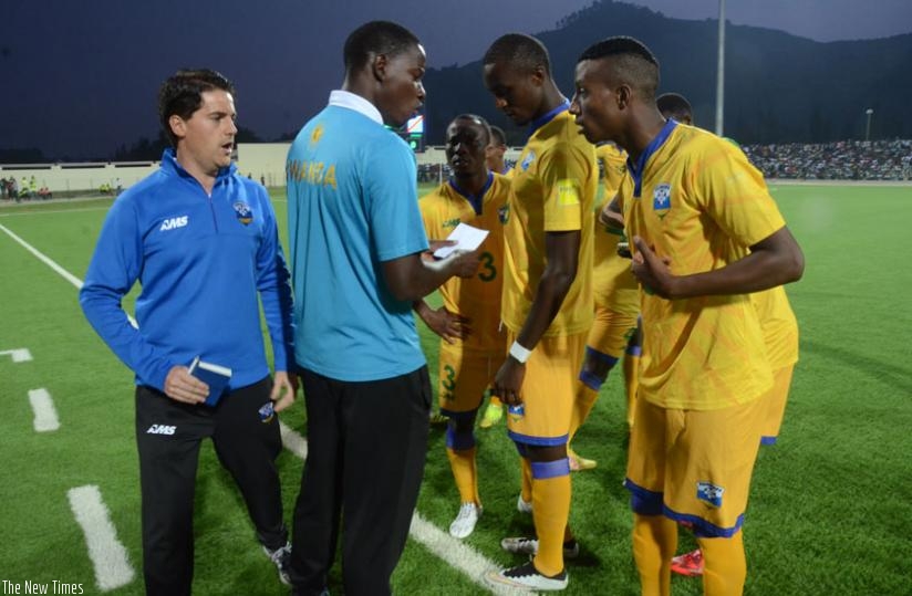 Amavubi coach McKinstry (L) and his assistant Jimmy Mulisa (C) give instructions to players during the friendly against DR Congo on Sunday. (S. Ngendahimana)