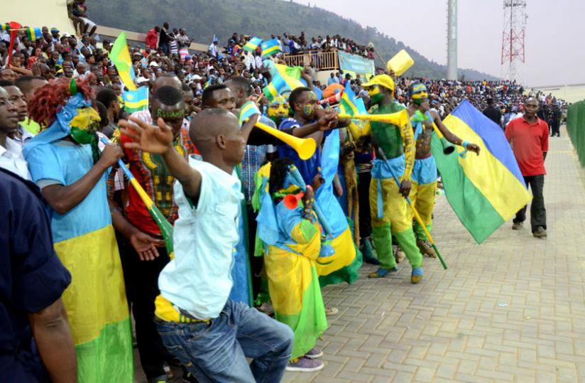 Amavubi fans celebrate during the 1-0 victory in the friendly match against DR Congo last Sunday at Umuganda Stadium in Rubavu. (Sam Ngendahimana)