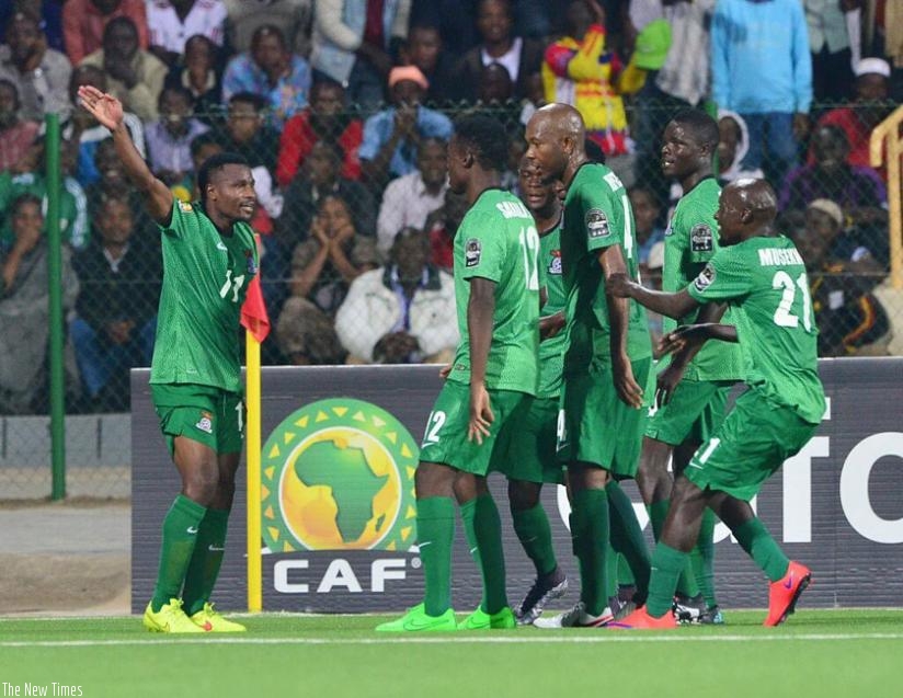 Christopher Katongo salutes his teammates as he celebrates his goal against Uganda. (Courtesy)