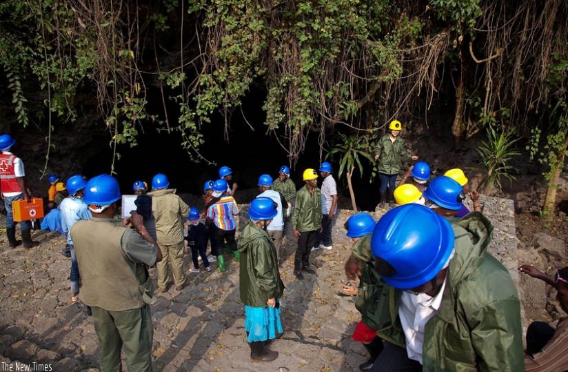 Tourists  get briefed before touring Musanze caves. (File)