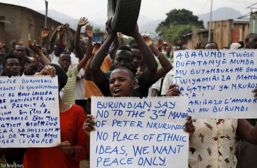 Protesters who are against Burundi President Pierre Nkurunziza and his bid for a third term march in Bujumbura (Net Photo)