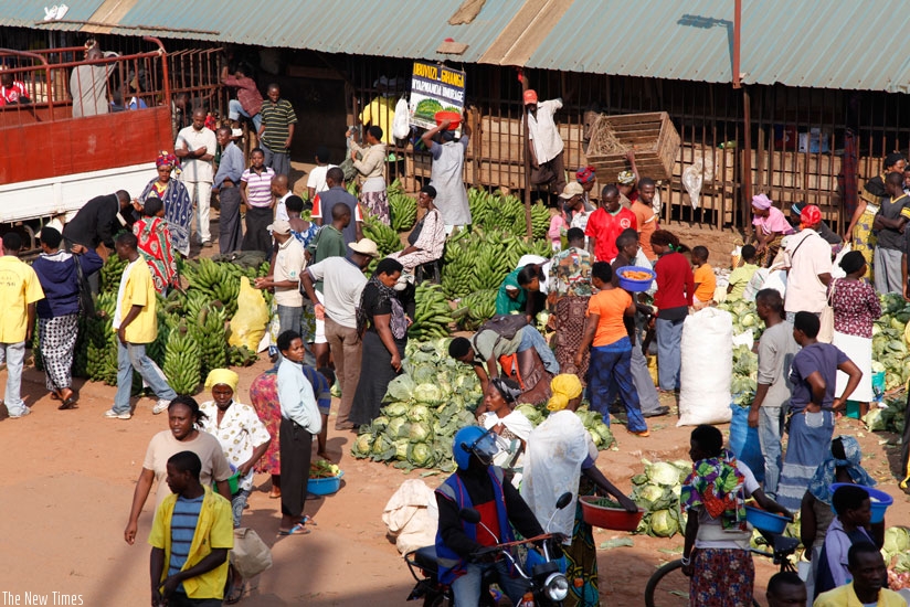 Shoppers at Kimironko foodstuff market in Kigaliu2019s Gasabo District. There is an ongoing debate on whether African countries, including Rwanda, should embrace genetically modified organisms to boost crop production. (File)