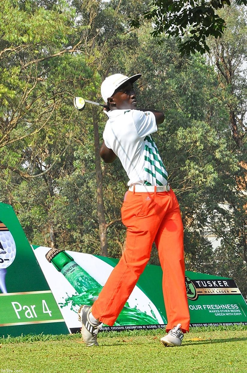 Adolf Muhumuza drives at the Tusker Malt Uganda Open day one on Wednesday at the Kitante golf course in Kampala. (Courtesy)