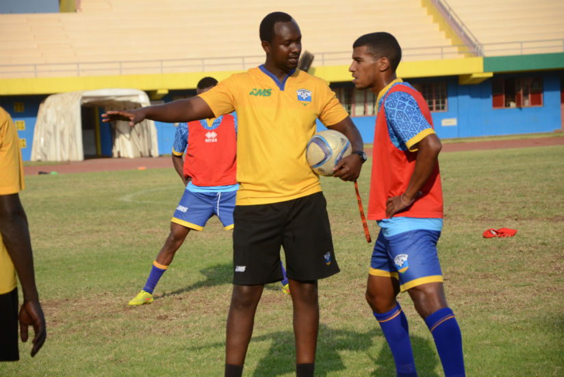 Mashami makes a point to striker Quintin Rushenguziminega during a previous training session. / File