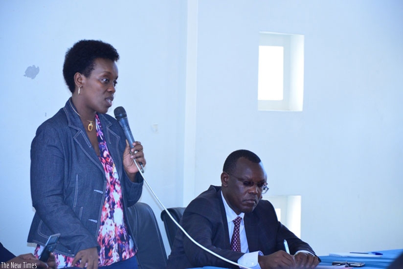 Dr Gashumba addresses health counsellors in Huye District as mayor Eugene Kayiranga follows. Inset are the CHWs at the meeting. (Michel Nkurunziza.)