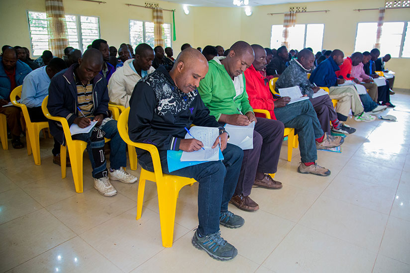 Former FDLR members take notes during a lesson at Mutobo camp in Musanze District. (File)