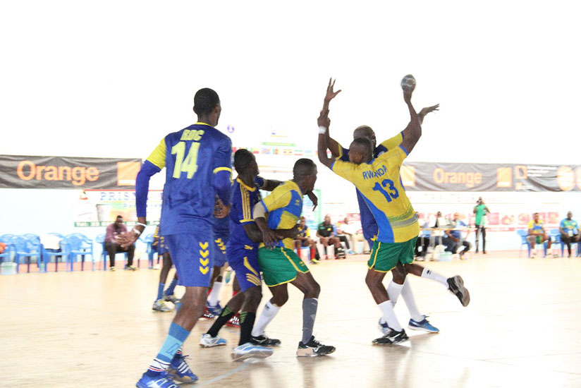 A Rwandan player trying to break through D.R. Congo's defense on Wednesday night. / Courtesy