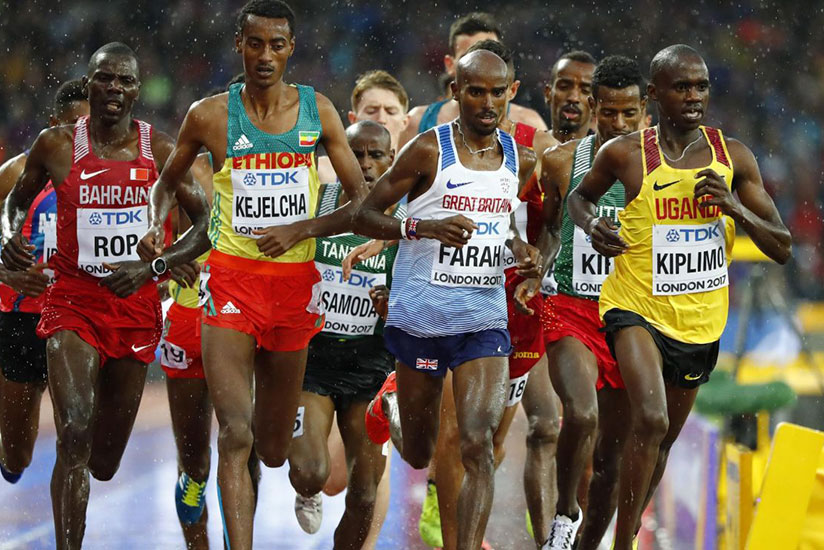 World and Olympic champion Mo Farah booked his place in the 5,000m final by finishing second in a rain-lashed heat at the London Stadium. / Internet photo