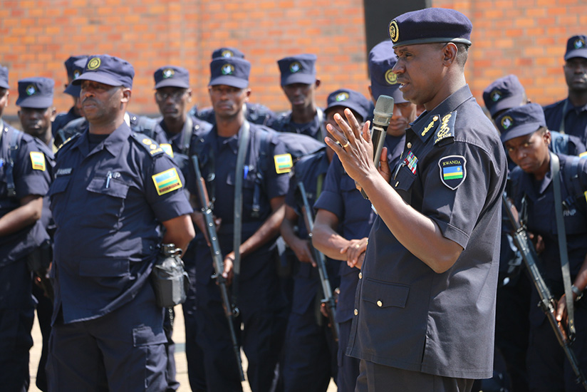 DIGP Dan Munyuza addressing officers during a pre-deployment briefing. / Courtesy