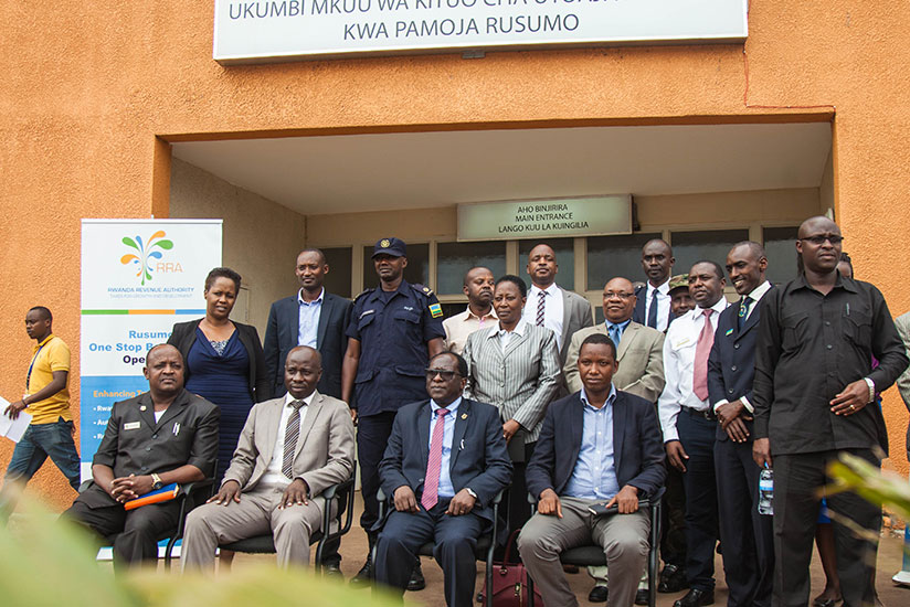 Officials pose for a photo after the launch at Rusumo yesterday. Nadege Imbabazi