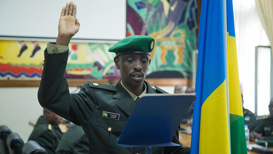 Major Phanuel Kalibu, swears in during judges of the Military High Court