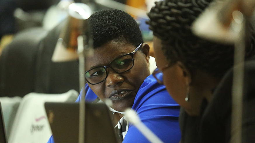 Members of the Parliament consult each other as Auditor General addresses MPs yesterday