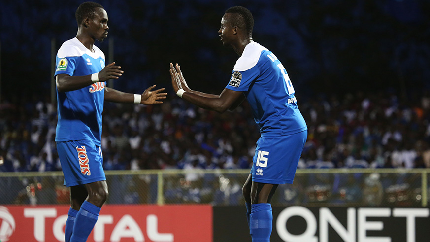 Defenders Mugabo and Faustin Usengimana chat after having some miscommunication during the match