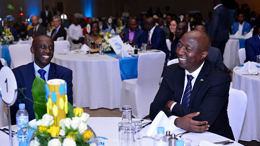 Marie Rose Mureshyankwano, the Governor  of Southern Province (L) and George Twala, South African High Commissioner to Rwanda and also the dean of envoys in Rwanda at the event.