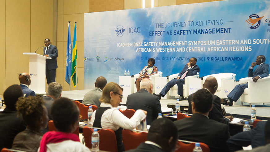 Minister for Infrastructure Claver Gatete speaks during the Africa Aviation Safety Management Symposium as Ghanaâ€™s Minister for Aviation, Cecilia Abena Dapaah; President of ICAO Council, Dr. Olumuyiwa Benard Aliu; and Ninsao Gnofam, Minister for Infrastructure and Transport of Togo listen.