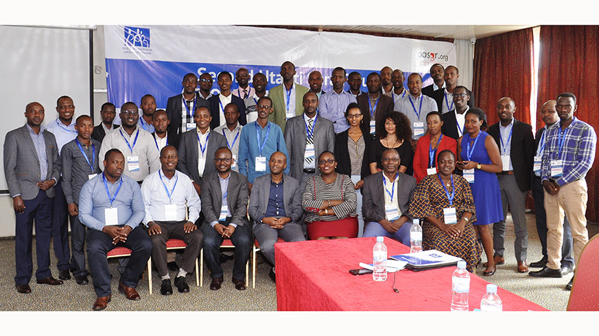 Forum participants in a group photo. Photo courtesy of IPAR-Rwanda