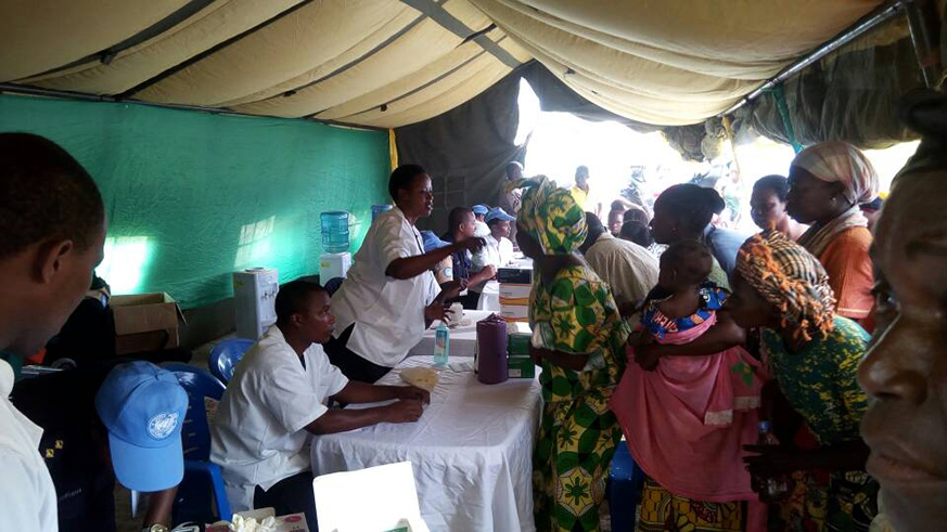 CAR residents line up for medical check-up. Courtesy photos.