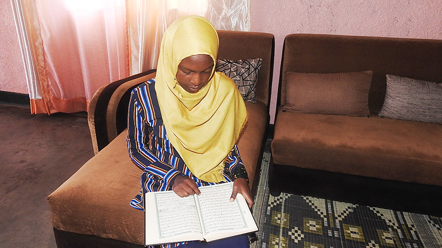 Aisha Nikuze started reading the Koran at a young age. All photos by Frederic Byumvuhore.