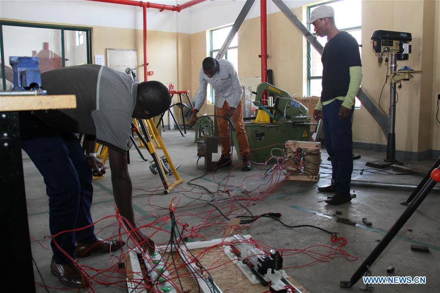 Students work on a project at a workshop in IPRC-Musanze. (Xinhua/Lyu Tianran)