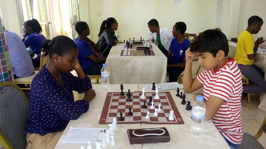 Students at a game of chess in Kigali at a past school tournament. (File)