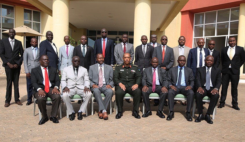 RDF Chief of Defence Staff General Patrick Nyamvumba (centre) poses with EAC chiefs and directors of intelligence in Kigali yesterday. Sam Ngendahimana.