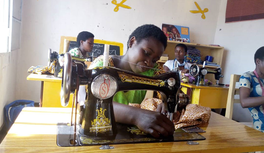 Beneficiaries at their work station. Courtesy photos