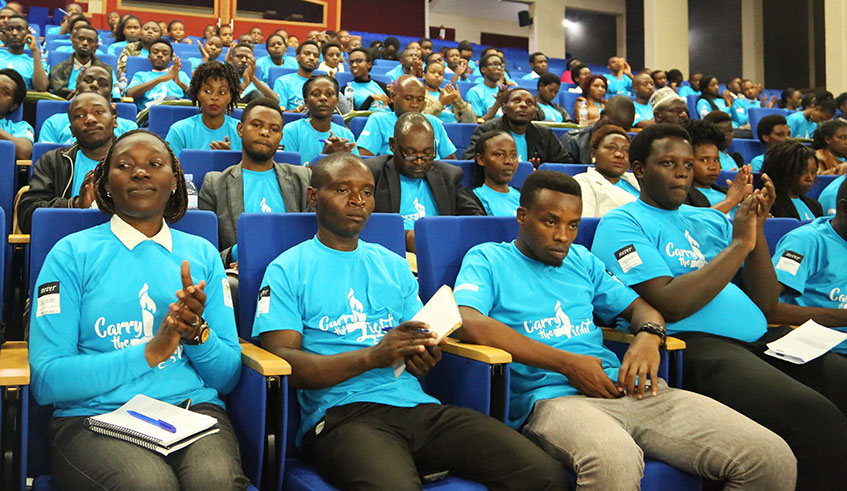 Youth representatives from all districts at the Parliamentary Buildings during an event to mark the International Peace Day yesterday. At the national level, the Peace Day celebrations were held under the theme: u2018Carry the Light-Twara Urumuriu2019, where youth representatives from all 30 districts engaged parliamentarians, government officials and UN representatives in what was dubbed the 'Youth Parliamentary Exchange'.  Sam Ngendahimana.