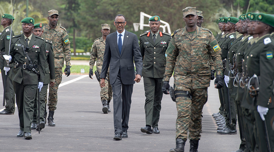 President Kagame inspects a guard of honour during the commissioning of 320 new Officer Cadets at the Rwanda Military Academy - Gako, in Bugesera District on Saturday. The officers are now part of the Rwanda Defence Force with the rank of 2nd Lieutenant. / Village Urugwiro