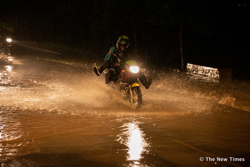 Road users struggling to pass through a flooded road in Kigali, on Monday, 03 March./ Emmanuel Kwizera