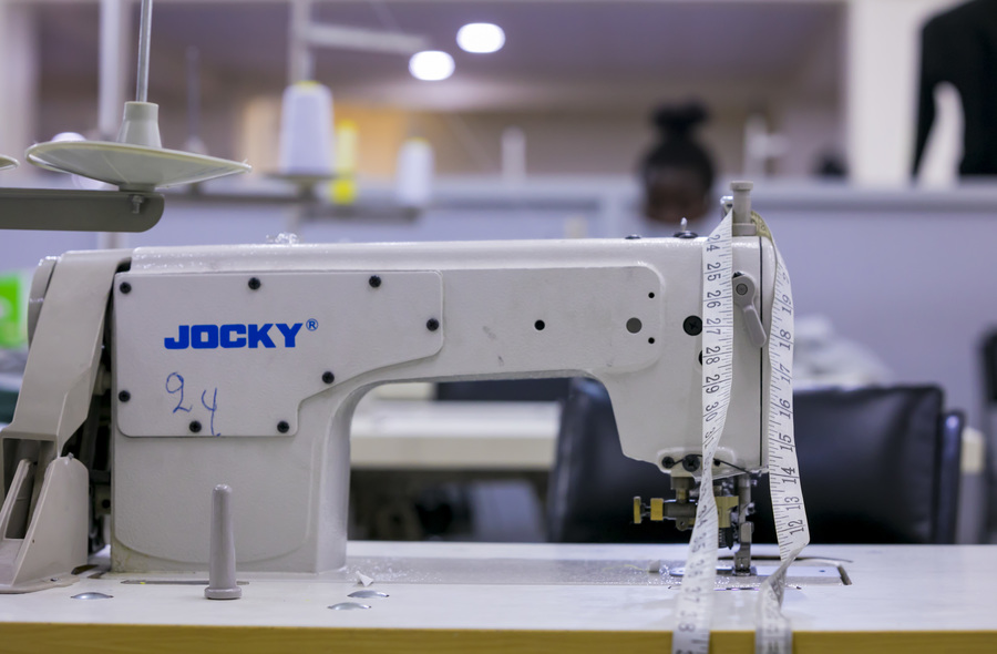 A woman at work at Weya Creations Garment Factory in Kigali. Through its â€˜Open Calls Programmeâ€™, the National Industrial Research and Development Agency (NIRDA) is helping garment manufacturers to upgrade their equipment. / Photo: Courtesy