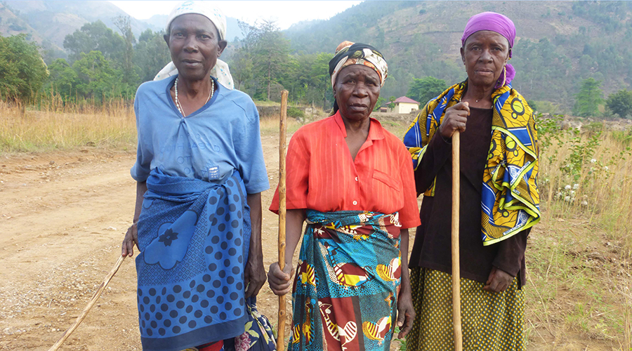 Three old women on the way from Amashyuza water pool in Rusizi District. 