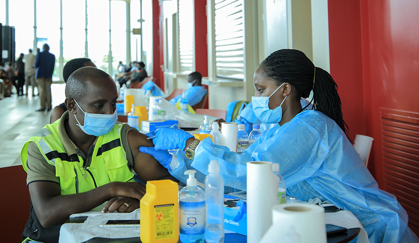 A man gets vaccinated recently. President Paul Kagame has commended the role of the Access to Covid-19 Tools (ACT) Accelerator in supporting countries to respond to the pandemic and promised Rwandau2019s unwavering support to this global effort. / Dan Nsengiyumva