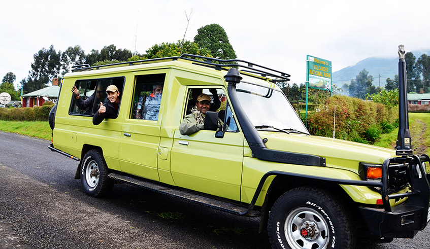 Tourists in a van after visiting mountain gorillas in the Volcanoes National Parks in 2019. / Photo: Sam Ngendahimana.