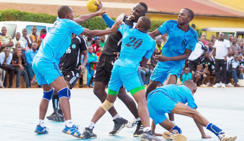 APR Handball team players in action against Police FC at Kimisagara play ground. / Sam Ngendahimana