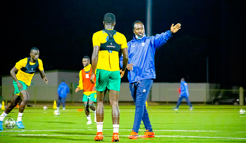 Amavubi head coach Vincent Mashami gives instructions to players during a training session at Kigali stadium this week. / Photo: Courtesy.