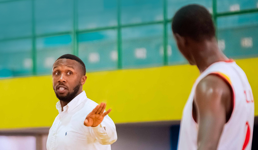 Alain Claude Kabera, a former player and current head coach of 30-Plus club, gives a player instructions during a league game against IPRC-Huye at Petit Stade last month.